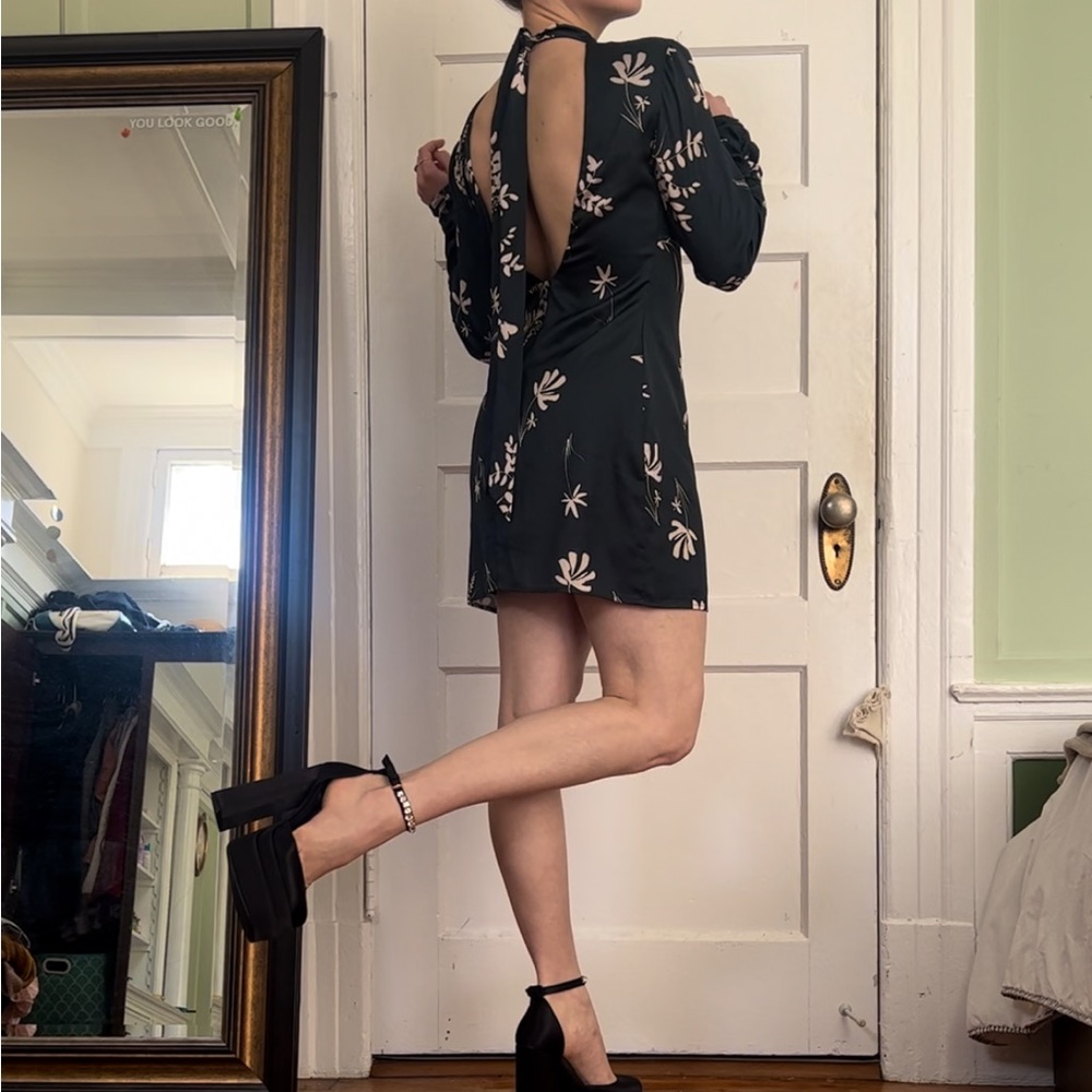 Green dress with long neck sash